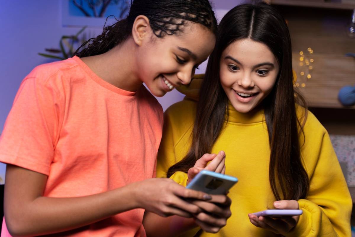 Two young women share a moment together.