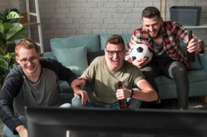 Friends enjoying a sports game.