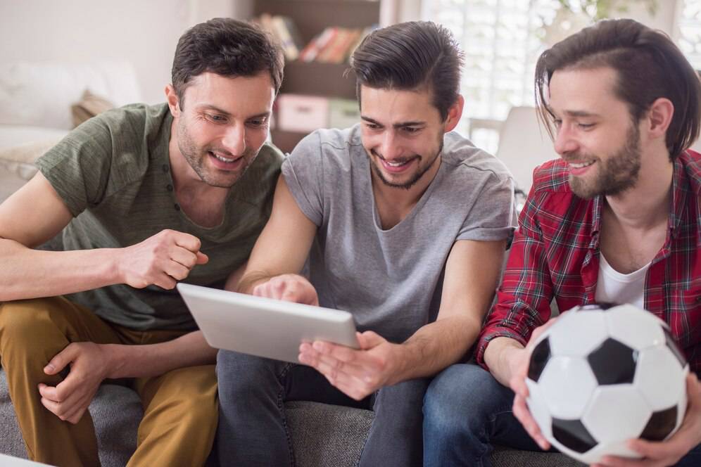Three friends enjoying a game.